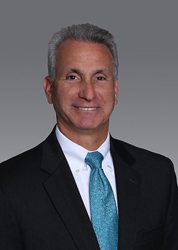 Larry E. Schner, Partner